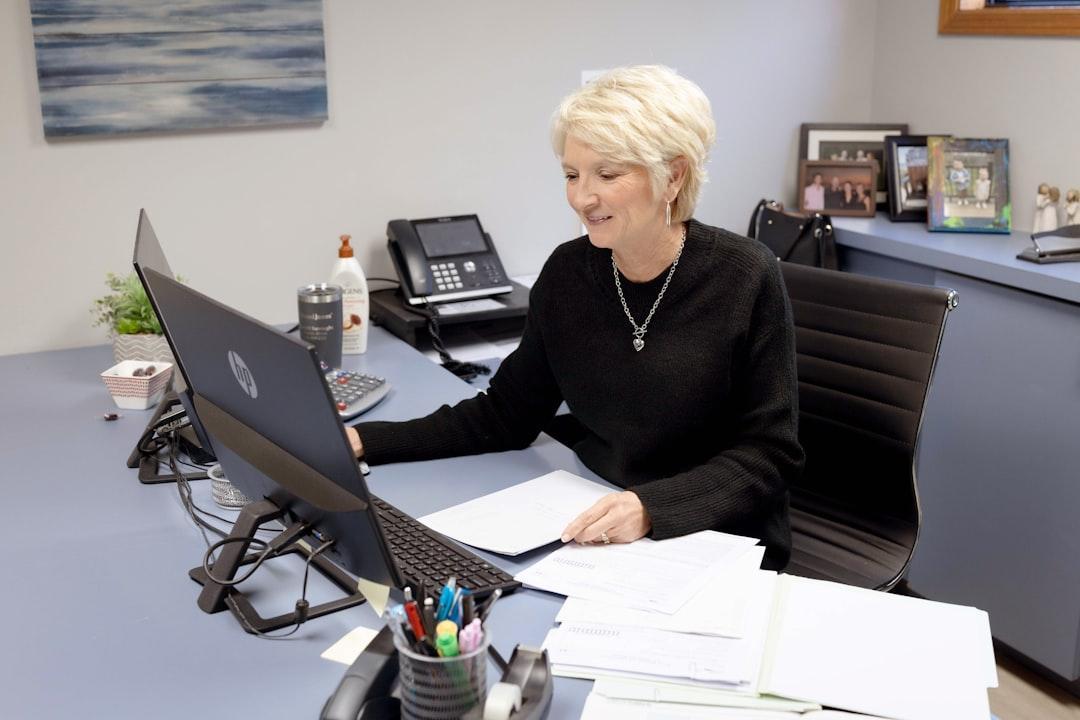 Attorney advising clients in office setting